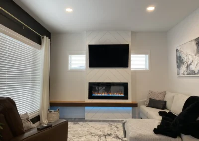 Fireplace Accent Lighting and Floating Bench