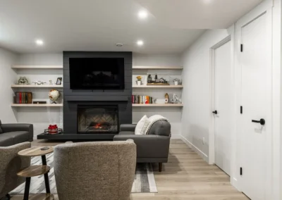 basement lounge with plush seating by Saskatoon basement developer Axium Interiors.