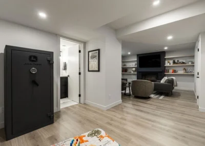 spacious basement with bright lighting by Saskatoon basement developer Axium Interiors.